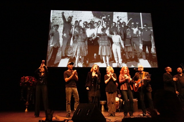 The memorial ended with a rendition of “Ain’t Gonna Let Nobody Turn Me Around”  led by Bonnie Raitt, together with the members of the First AME Choir. Left to right: Me, Tom Morello, Barbara Williams, Holly Near, Bonnie Raitt & James McVay with the guitar. 